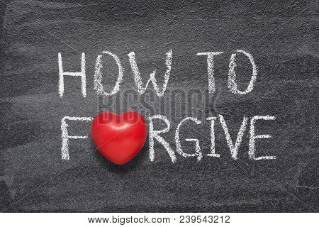 How To Forgive Phrase Handwritten On Chalkboard With Red Heart Symbol Instead Of O