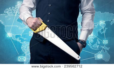 Businessman holding tool with global map graphic on the background