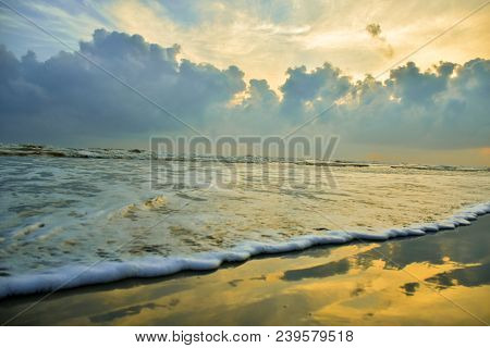 Sunrise Over The Sea With Nice Clouds