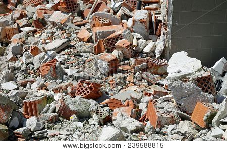 Many Debris And Bricks Of A Damaged House