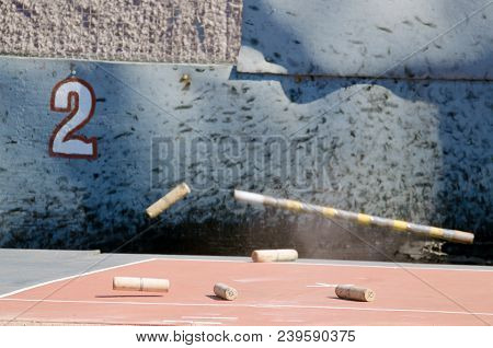Gorodki - A Russian Folk Sports Game. In This Game You Need Specific Distances To Smash Figures Made