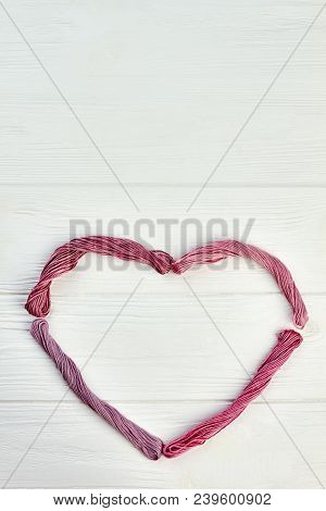 Happy Valentines Day Wooden Background. Heart From Threads And Copy Space On Top. Valentines Holiday