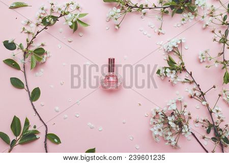 Essence Of Flowers On A Table In A Beautiful Glass Jar.