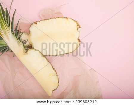 Half Cut Juicy Pineapple On A Pastel Pink Background. Minimal Summer Concept.