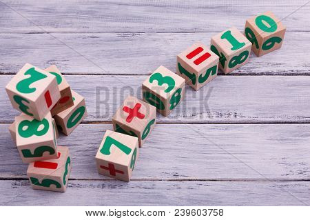 Educational Wooden Toys For Children. Colorful Geometric Figures On The Wooden Background. Ecologica