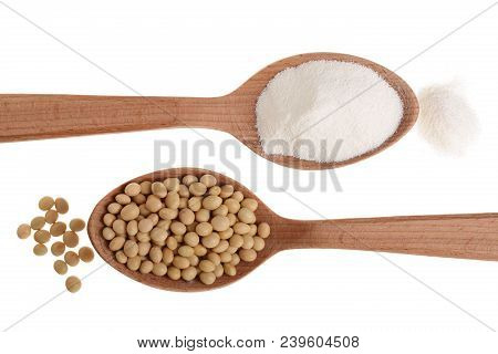 Soybeans And Dried Soy Milk In Wooden Spoon Isolated On White Background Top View.