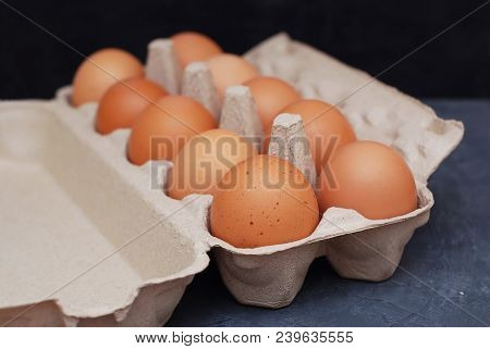 Raw Farm Eggs On A Dark Blue Wooden Rustic Background Food Ingredient