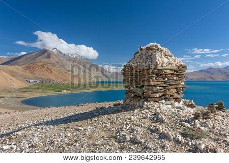 Simple Buddhist stone stupa near the Karzok village and Tso Moriri Lake located in Rupshu valley in Ladakh, India