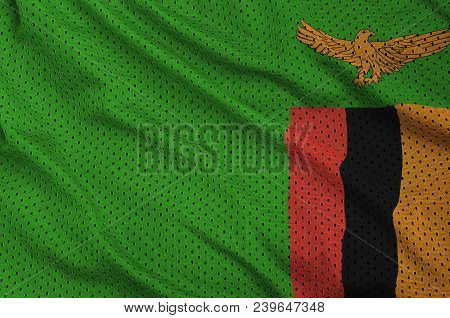 Zambia Flag Printed On A Polyester Nylon Sportswear Mesh Fabric With Some Folds