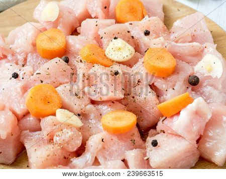 Sliced Chicken Meat For Cooking Vegetables On Table