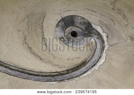 Nearly Abstract Full Frame Detail Showing The Ground Of A Sedimentation Tank