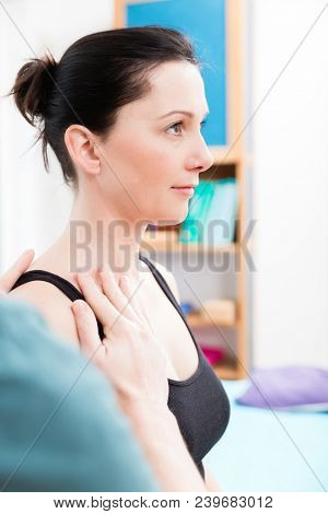 Orthopaedist checking stance of patient for physiotherapy