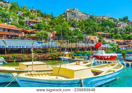 Kalekoy, Turkey - May 5, 2017: The Scenic Tourist Harbor With Boats, Yachts, View On Cafes, Cottages