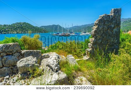 The View On Sail Yachts In Harbor Of Ucagiz From The Archaeological Site Of Lycian Necropolis, Kekov