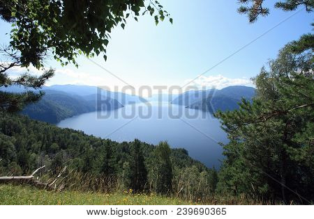 Kind On Lake Teletskoe, Siberia From Mountain Chichilgan.endless Taiga, Mountains And Water