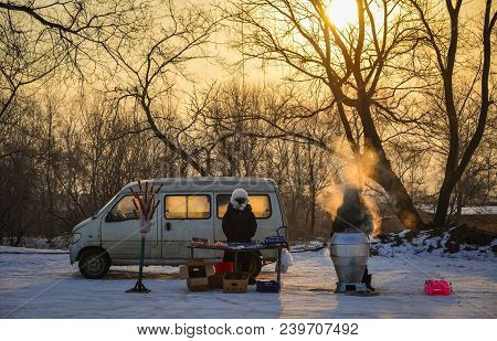 Harbin, China - Feb 25, 2018. Street Vendors At Winter In Harbin, China. Harbin Is The Capital Of He