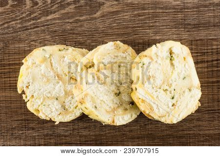 Calsbad Bread Dumpling Top View Three Slices Isolated On Brown Wood Background Fresh Steamed