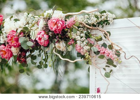 Archway Of Many Beautifil Flowers, Wedding Arch With Peones. Ceremony