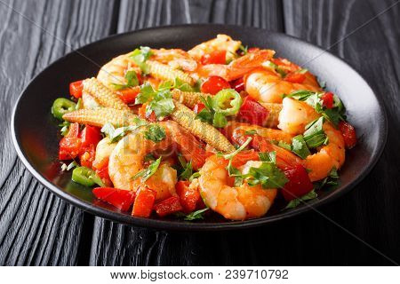 Freshly Prepared Mexican Prawns With Sweet Peppers, Chili, Garlic, Corn Cobs And Herbs Close-up. Hor