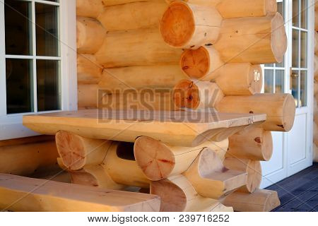 Closeup View Of Corner Of Wooden House Made Of Natural Logs - Wooden Construction Background