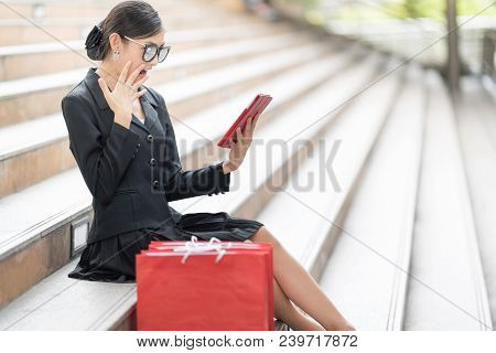 Attractive And Exusive Business Woman Wearing Modern Sunglass With Lot Of Red Shopping Bags. Happy A
