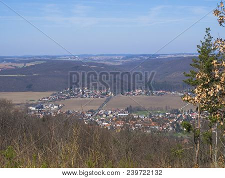 View On Village In Brdy In Czech Republic With Trees, Buildings And Hills, Early Spring, Blue Sky Ba