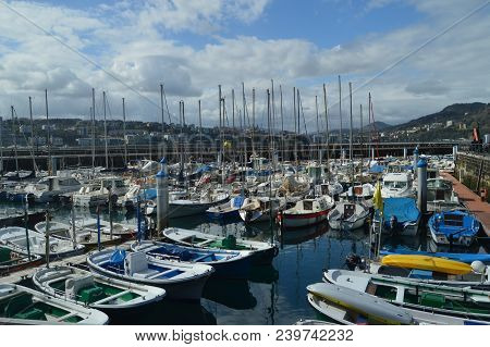 Port In San Sebastian With Its Colorful Beautiful Fishing Vessels. Fishing Travel Nature. March 26, 