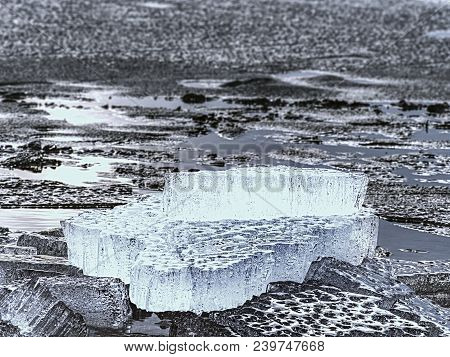 Pieces Of Clear Natural Ice On Frozen Lake,  Very Close Up View. Early Mealting Of Ice, Ecology Prob