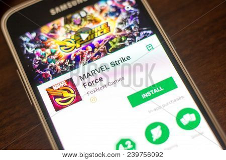 Ryazan, Russia - May 04, 2018: Marvel Strike Force Mobile App On The Display Of Cell Phone