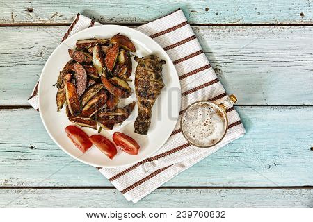 Roasted Chicken Legs With Baked Potatoes. Top View. Copy Space