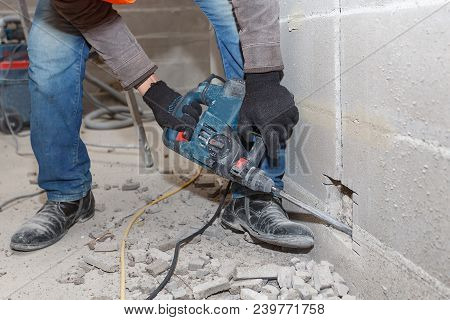 Slotting Of The Wall Under The Wiring With A Perforator.