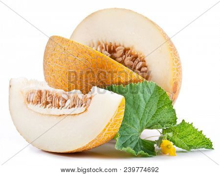 Ripe melons with fresh melon leaves on white background.