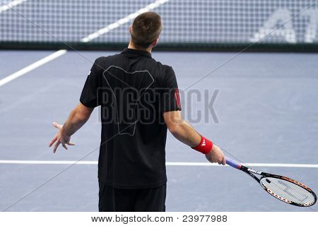 BUKIT JALIL, Malezya - Ekim 01: Onun Malezya sırasında kötü bir atış sonra Sırbistan'ın Viktor Troicki reaksiyona girer