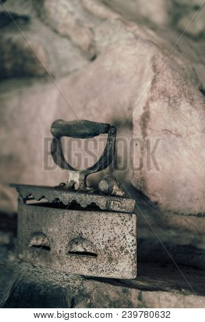 Old Vintage Iron On The Charcoal On Display In Museum