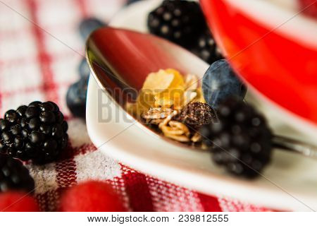 Macro View Of Blackberries, Blueberries, Raspberries And Muesli