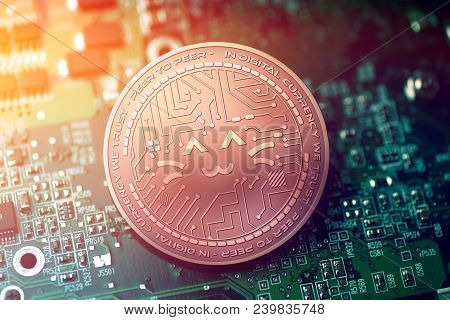 Shiny Copper Wys Cryptocurrency Coin On Blurry Motherboard Background Token