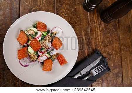 Red Fish Salmon With Radish And Spinach, Served On White Plate On Wooden Table. Rustick Style. View 