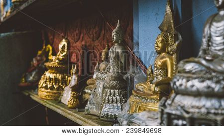 Thai Statues In The Temple Close-up. Buddha Murtis In Details In Details