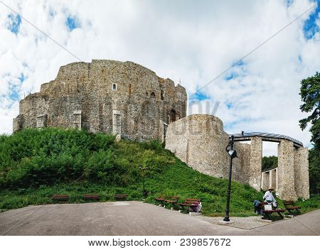 Targu Neamt, Romania - September 5, 2017: Unknown Man Offers Tourists To Look At The Fortress From O