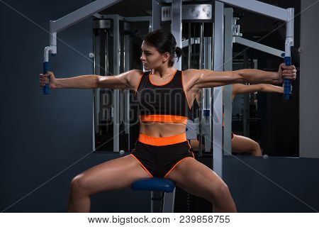 Sport. Beautiful Woman In Gym. Halthy Concept Fitness