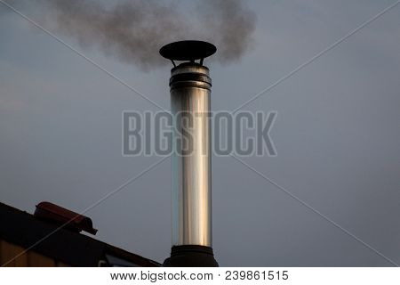 Stainless Steel Chimney. Close Up On House Coaxial Stainless Steel Chimney Pipe. Building.