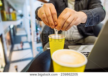 Man Put Sugar In Coffee Cup. White Death. Wide Angle