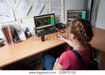Bogandinskiy, Russia - April 20, 2018: Stekloteh Factory On Bottles Production. Female Engineer Work