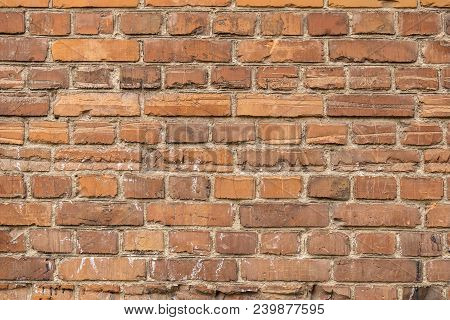 Close Up Of Natural Materials Backstop. Pattern Of Vintage Ruined Sandstone Block Facade On Backgrou