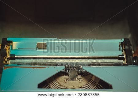 Vintage Retro Old Scrathed Metal Typewriter Upper Part. Copyspace. Close-up