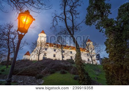 Bratislava Castle Or Bratislavsky Hrad At Night. The Main Castle Of Capital City Of Slovakia.