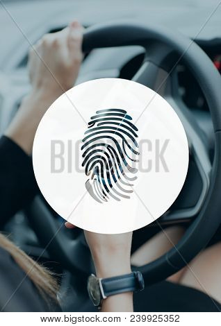 Finger print icon against woman in the car