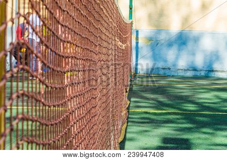 Tennis Court With A Grid For Professional Games. Bag For Rackets.