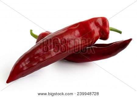 Two Ramiro Sweet Pointed Peppers Isolated On White.