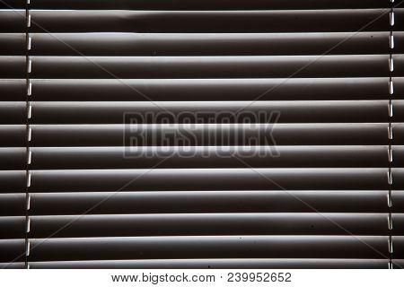 Blinds In A Home Catching The Sunlight,metal Shutter Window Background.blinds. Window Blind. Blind B